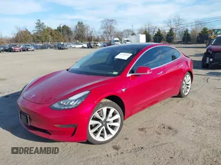 2019 Tesla Model 3 Mid Range with VIN 5YJ3E1EA3KF466418, listed as a IAAI auction lot 41724564 with 53,774 mi miles and . Bid and sale history available at DreamBid. Image 2.