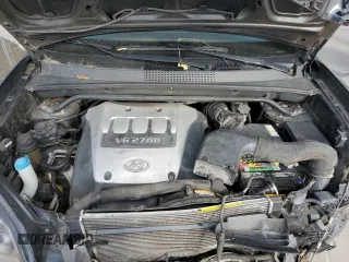 2005 Hyundai Tucson GLS with VIN KM8JN12D85U062222, listed as a Copart auction lot 77317334 with 192,758 mi miles and Salvage Title. Bid and sale history available at carsss.com. Image 12.