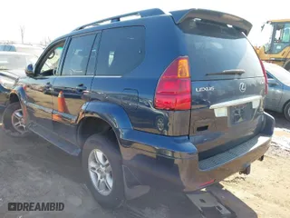 2003 Lexus GX 470 with VIN JTJBT20XX30016572, listed as a IAAI auction lot 41782620 with 127,024 mi miles. Bid and sale history available at carsss.com. Image 3.