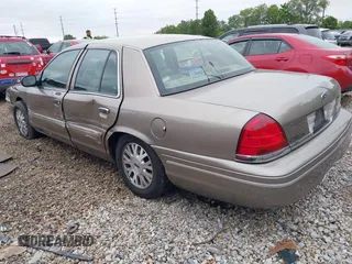 2004 Ford Crown Victoria LX с VIN 2FAFP74W74X114961, выставлен на аукционе IAAI как лот 42347867 с пробегом 170 867 миль миль и . История ставок и продаж доступна на DreamBid. Изображение 3.