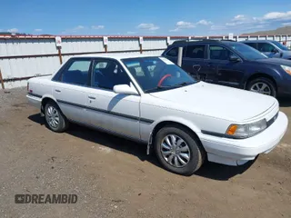 1990 Toyota Camry LE ECT z VIN JT2SV22E1L3427911, wystawiony jako IAAI lot #42040646 z przebiegiem 133 129 mil mil oraz . Historia ofert i sprzedaży dostępna na DreamBid. Obrazek 1.