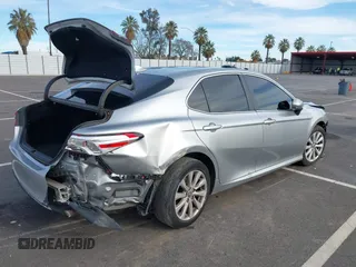 2019 Toyota Camry LE with VIN 4T1B11HK7KU803624, listed as a IAAI auction lot 41589107 with 169,863 mi miles and . Bid and sale history available at DreamBid. Image 4.
