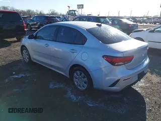 2023 Kia Rio LX with VIN 3KPA24ADXPE606463, listed as a IAAI auction lot 41728523 with 8,909 mi miles and . Bid and sale history available at DreamBid. Image 3.