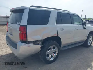 2015 Chevrolet Tahoe LT with VIN 1GNSCBKC9FR111984, listed as a IAAI auction lot 42003685 with 186,391 mi miles and . Bid and sale history available at DreamBid. Image 6.