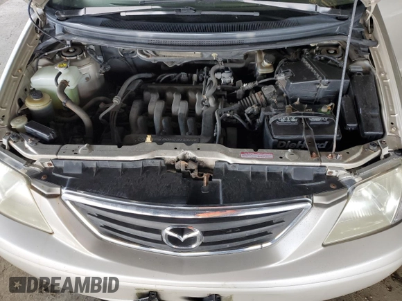 2000 Mazda MPV DX with VIN JM3LW28G8Y0142883, listed as a Copart auction lot 82633154 with 161,196 mi miles and Salvage title. Bid and sale history available at DreamBid. Image 12.