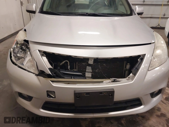 2012 Nissan Versa SV with VIN 3N1CN7AP2CL938479, listed as a IAAI auction lot 41918877 with 150,000 mi miles and . Bid and sale history available at DreamBid. Image 6.
