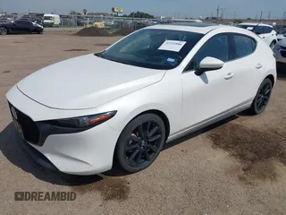 2021 Mazda 3 Premium z VIN JM1BPAML5M1402899, wystawiony jako IAAI lot #42252886 z przebiegiem Nie podano mil oraz . Historia ofert i sprzedaży dostępna na DreamBid. Obrazek 2.
