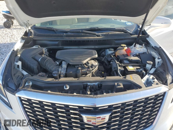 2022 Cadillac XT5 FWD Premium Luxury with VIN 1GYKNCRS1NZ125487, listed as a Copart auction lot 42081675 with 67,702 mi miles and Salvage title. Bid and sale history available at DreamBid. Image 14.