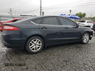2014 Ford Fusion SE with VIN 3FA6P0H7XER330023, listed as a Copart auction lot 48658285 with 225,660 mi miles and Salvage Title. Bid and sale history available at DreamBid. Image 3.