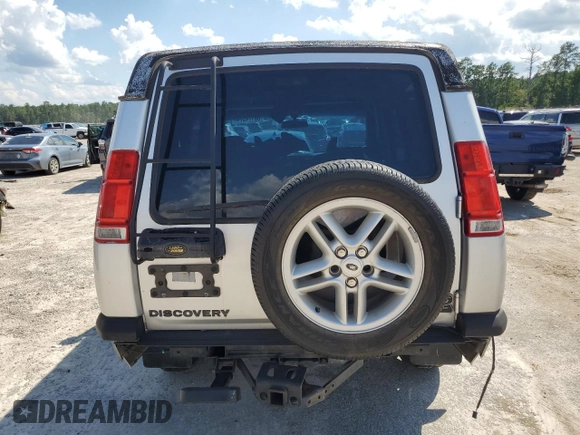 2004 Land Rover Discovery SE z VIN SALTY194X4A859428, wystawiony jako Copart lot #68174574 z przebiegiem Nie podano mil oraz Czysty tytuł • Clean title. Historia ofert i sprzedaży dostępna na DreamBid. Obrazek 6.