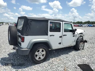 2012 Jeep Wrangler Unlimited Sport with VIN 1C4BJWDG6CL240673, listed as a Copart auction lot 60669625 with Not provided miles and Salvage title. Bid and sale history available at DreamBid. Image 3.