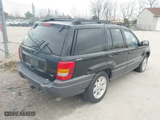 2001 Jeep Grand Cherokee Laredo with VIN 1J4GW48N91C644952, listed as a IAAI auction lot 40825099 with 1 mi miles. Bid and sale history available at carsss.com. Image 4.