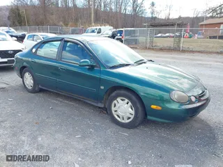 1999 Ford Taurus SE with VIN 1FAFP53S5XA102534, listed as a IAAI auction lot 41740212 with 154,926 mi miles. Bid and sale history available at carsss.com. Image 1.