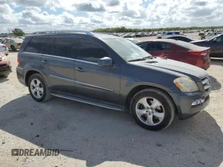 2011 Mercedes-Benz GL-Class GL 450 with VIN 4JGBF7BE2BA654807, listed as a Copart auction lot 77133244 with 133,748 mi miles and Salvage Title. Bid and sale history available at carsss.com. Image 4.