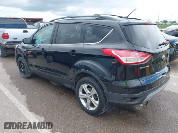 2013 Ford Escape SE z VIN 1FMCU9GX0DUB85914, wystawiony jako IAAI lot #42161300 z przebiegiem 185 255 mil mil oraz . Historia ofert i sprzedaży dostępna na DreamBid. Obrazek 3.
