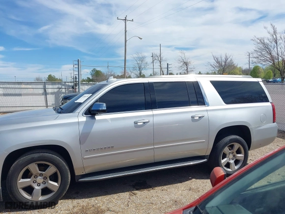 2020 Chevrolet Suburban Premier with VIN 1GNSCJKCXLR219679, listed as a IAAI auction lot 41806579 with 90,132 mi miles. Bid and sale history available at carsss.com. Image 14.
