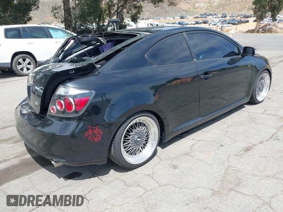 2008 Scion tC Spec with VIN JTKDE167X80256518, listed as a IAAI auction lot 42238691 with 245,294 mi miles and . Bid and sale history available at DreamBid. Image 4.