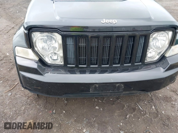 2012 Jeep Liberty Arctic z VIN 1C4PJMAK5CW111521, wystawiony jako IAAI lot #42611294 z przebiegiem 104 644 mil mil oraz . Historia ofert i sprzedaży dostępna na DreamBid. Obrazek 6.