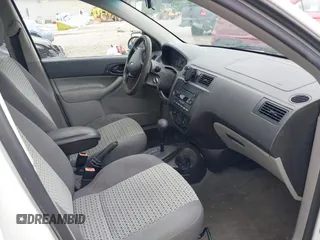 2007 Ford Focus S z VIN 1FAFP34N07W236755, wystawiony jako IAAI lot #42536269 z przebiegiem 116 074 mil mil oraz . Historia ofert i sprzedaży dostępna na DreamBid. Obrazek 5.