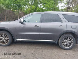 2014 Dodge Durango Citadel with VIN 1C4RDJEG2EC520939, listed as a IAAI auction lot 42272953 with 191,458 mi miles and . Bid and sale history available at DreamBid. Image 14.