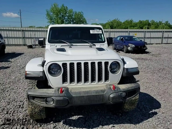 2023 Jeep Gladiator Rubicon with VIN 1C6JJTBG9PL546437, listed as a Copart auction lot 55516685 with 14,106 mi miles and Salvage title. Bid and sale history available at DreamBid. Image 13.
