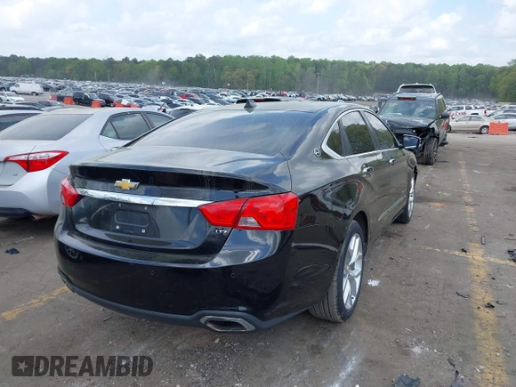 2014 Chevrolet Impala LTZ with VIN 1G1155S32EU155880, listed as a IAAI auction lot 41964572 with 184,992 mi miles and . Bid and sale history available at DreamBid. Image 4.