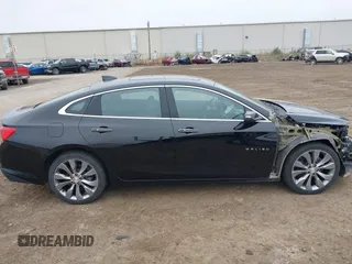 2016 Chevrolet Malibu Premier with VIN 1G1ZH5SX7GF210635, listed as a IAAI auction lot 40751377 with 131,043 mi miles and . Bid and sale history available at DreamBid. Image 13.