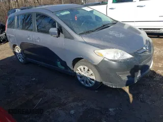 2010 Mazda 5 Sport z VIN JM1CR2W39A0379291, wystawiony jako IAAI lot #41728402 z przebiegiem 159 804 mil mil oraz . Historia ofert i sprzedaży dostępna na DreamBid. Obrazek 1.