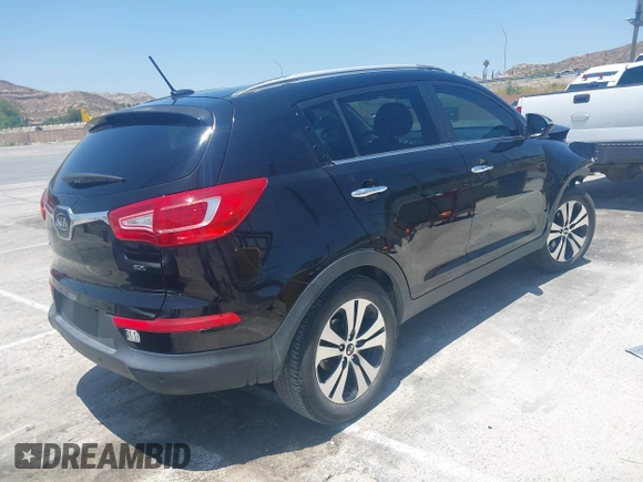 2012 Kia Sportage EX with VIN KNDPC3A25C7245525, listed as a IAAI auction lot 42463238 with 198,938 mi miles and . Bid and sale history available at DreamBid. Image 4.