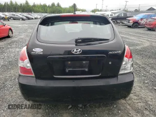 2009 Hyundai Accent Man L with VIN KMHCN35C09U136021, listed as a Copart auction lot 60409544 with 150,022 mi miles and Clean Title. Bid and sale history available at carsss.com. Image 6.