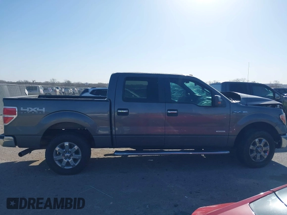 2013 Ford F-150 XL with VIN 1FTFW1ET5DKE02740, listed as a IAAI auction lot 41808135 with 185,304 mi miles. Bid and sale history available at carsss.com. Image 14.