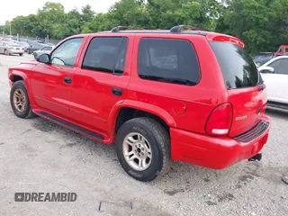 2003 Dodge Durango z VIN 1D4HR58Z83F599937, wystawiony jako IAAI lot #42483916 z przebiegiem 242 428 mil mil oraz . Historia ofert i sprzedaży dostępna na DreamBid. Obrazek 3.