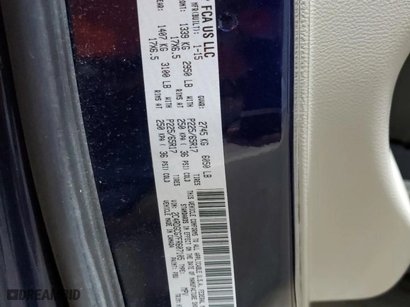 2015 Dodge Grand Caravan SXT with VIN 2C4RDGCG7FR607105, listed as a Copart auction lot 52650415 with 196,202 mi miles and Clean Title. Bid and sale history available at carsss.com. Image 13.