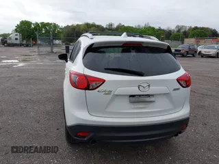 2016 Mazda CX-5 Touring with VIN JM3KE4CY0G0903723, listed as a IAAI auction lot 41966516 with 107,569 mi miles. Bid and sale history available at carsss.com. Image 16.