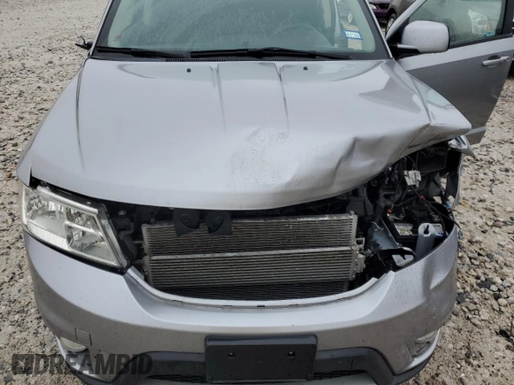 2017 Dodge Journey SXT with VIN 3C4PDCBB0HT545567, listed as a Copart auction lot 57766105 with 56,569 mi miles and Salvage title. Bid and sale history available at DreamBid. Image 12.