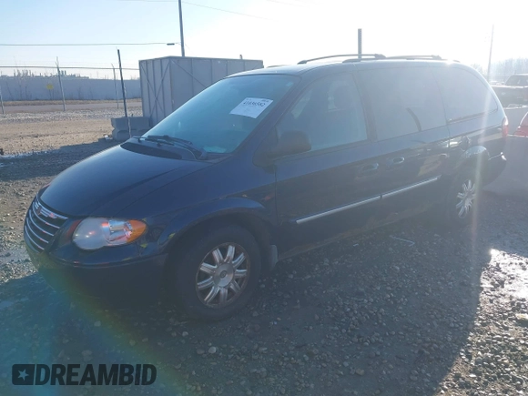 2006 Chrysler Town & Country Touring with VIN 2A4GP54L46R805276, listed as a IAAI auction lot 41036582 with 145,534 mi miles and . Bid and sale history available at DreamBid. Image 2.