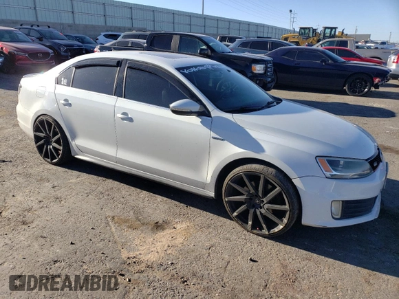 2014 Volkswagen Jetta GLI with VIN 3VW4T7AJ8EM287825, listed as a Copart auction lot 61809114 with 123,305 mi miles and Salvage title. Bid and sale history available at DreamBid. Image 4.