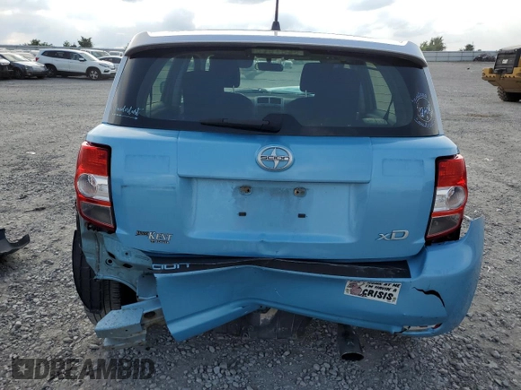 2014 Scion xD with VIN JTKKUPB41E1044556, listed as a Copart auction lot 57123795 with Not provided miles and Salvage title. Bid and sale history available at DreamBid. Image 6.