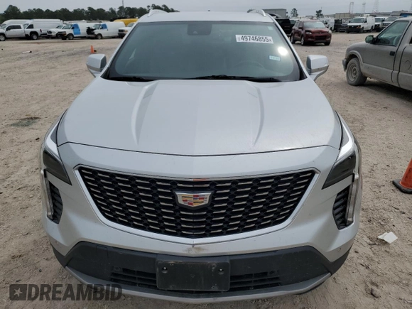2021 Cadillac XT4 FWD Premium Luxury with VIN 1GYFZCR41MF002411, listed as a Copart auction lot 49746855 with 81,938 mi miles and Salvage title. Bid and sale history available at DreamBid. Image 5.