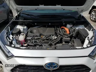 2023 Toyota RAV4 Hybrid XSE with VIN 2T3E6RFVXPW040152, listed as a Copart auction lot 61645565 with 26,408 mi miles and Salvage title. Bid and sale history available at DreamBid. Image 12.