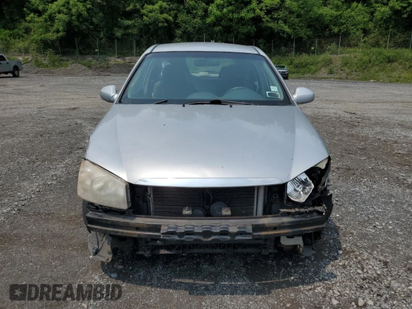 2005 Kia Spectra z VIN KNAFE162755170129, wystawiony jako Copart lot #60217065 z przebiegiem 94 458 mil mil oraz Szkoda całkowita • Salvage title. Historia ofert i sprzedaży dostępna na DreamBid. Obrazek 5.