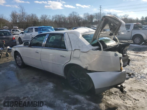 2004 Cadillac DeVille DTS z VIN 1G6KF57964U242365, wystawiony jako Copart lot #41645555 z przebiegiem Nie podano mil oraz Szkody całkowita. Historia ofert i sprzedaży dostępna na DreamBid. Obrazek 2.