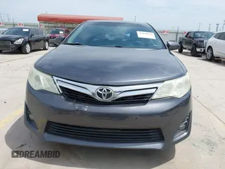 2014 Toyota Camry L with VIN 4T4BF1FKXER379158, listed as a IAAI auction lot 42050926 with 88,060 mi miles and . Bid and sale history available at DreamBid. Image 12.