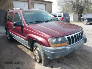2000 Jeep Grand Cherokee Laredo z VIN 1J4GW48SXYC425028, wystawiony jako IAAI lot #41789408 z przebiegiem Nie podano mil oraz . Historia ofert i sprzedaży dostępna na DreamBid. Obrazek 1.
