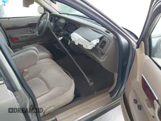 2001 Mercury Grand Marquis GS z VIN 2MEFM74W41X702619, wystawiony jako IAAI lot #42323749 z przebiegiem 124 748 mil mil oraz . Historia ofert i sprzedaży dostępna na DreamBid. Obrazek 5.
