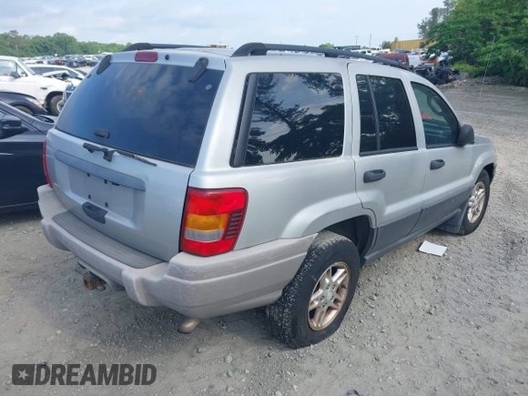 2004 Jeep Grand Cherokee Laredo z VIN 1J4GW48S54C106405, wystawiony jako IAAI lot #42315689 z przebiegiem 104 416 mil mil oraz . Historia ofert i sprzedaży dostępna na DreamBid. Obrazek 4.