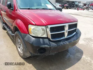 2007 Dodge Durango SXT z VIN 1D8HD38P67F573603, wystawiony jako IAAI lot #42360216 z przebiegiem 226 819 mil mil oraz . Historia ofert i sprzedaży dostępna na DreamBid. Obrazek 6.