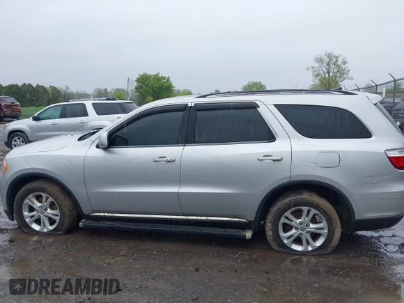 2012 Dodge Durango Crew with VIN 1C4RDJDG0CC322388, listed as a IAAI auction lot 42179814 with 124,009 mi miles and . Bid and sale history available at carsss.com. Image 14.