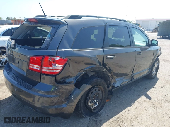 2017 Dodge Journey SE with VIN 3C4PDCAB2HT579852, listed as a IAAI auction lot 42008261 with 112,234 mi miles and . Bid and sale history available at DreamBid. Image 4.