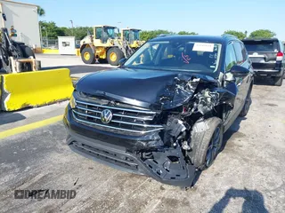 2024 Volkswagen Tiguan SE with VIN 3VVNB7AXXRM199400, listed as a IAAI auction lot 42216941 with 11,581 mi miles and . Bid and sale history available at DreamBid. Image 6.